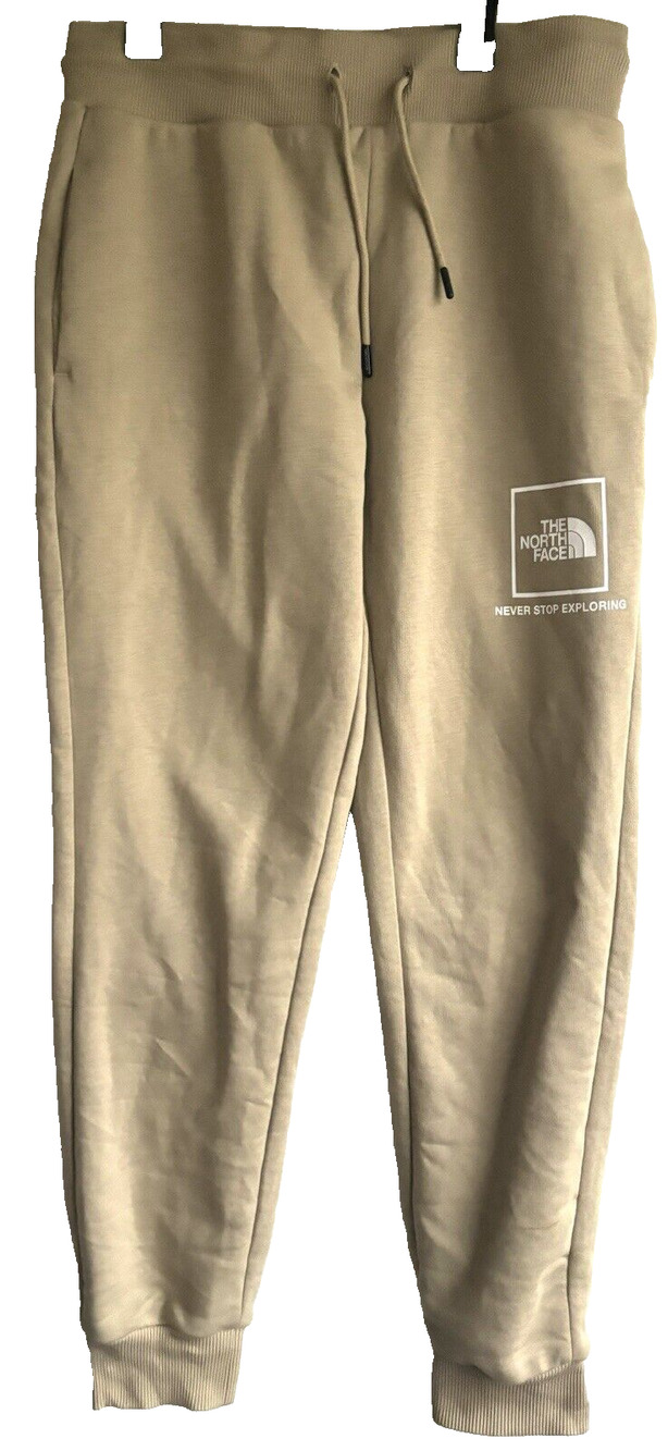 Women’s The North Face Sweatpants Tan Size M Joggers Never stop exploring Logo